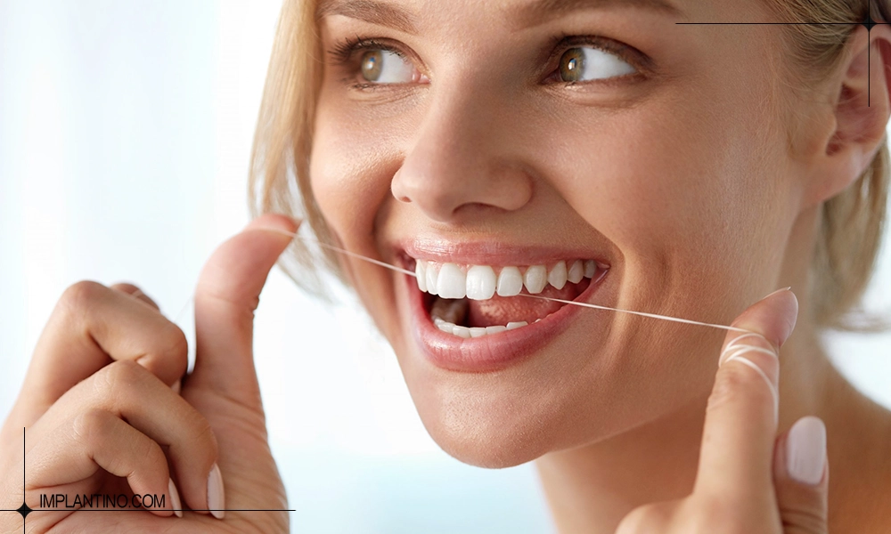 آشنایی با نحوه صحیح نخ دندان کشیدن 4 نخ دندان کشیدن دندان جلو