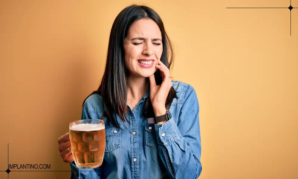 تاثیر مصرف الکل روی دندان چگونه است؟ 1 اثر الکل روی دندان های خانمی که دچار درد شده است.