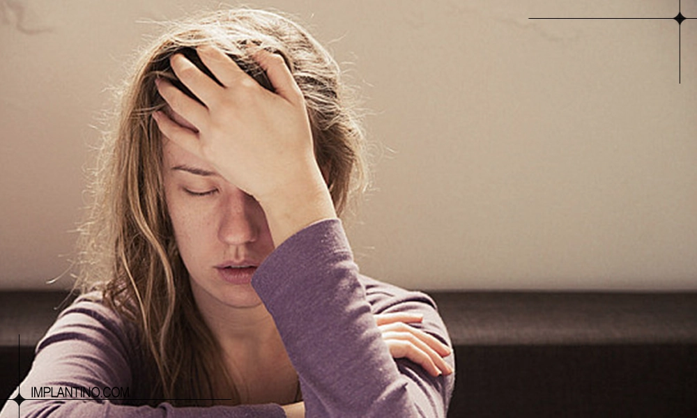 دلیل ضعف بعد از ایمپلنت و راه های درمان 2 ضعف بعد از ایمپلنت در یک خانم