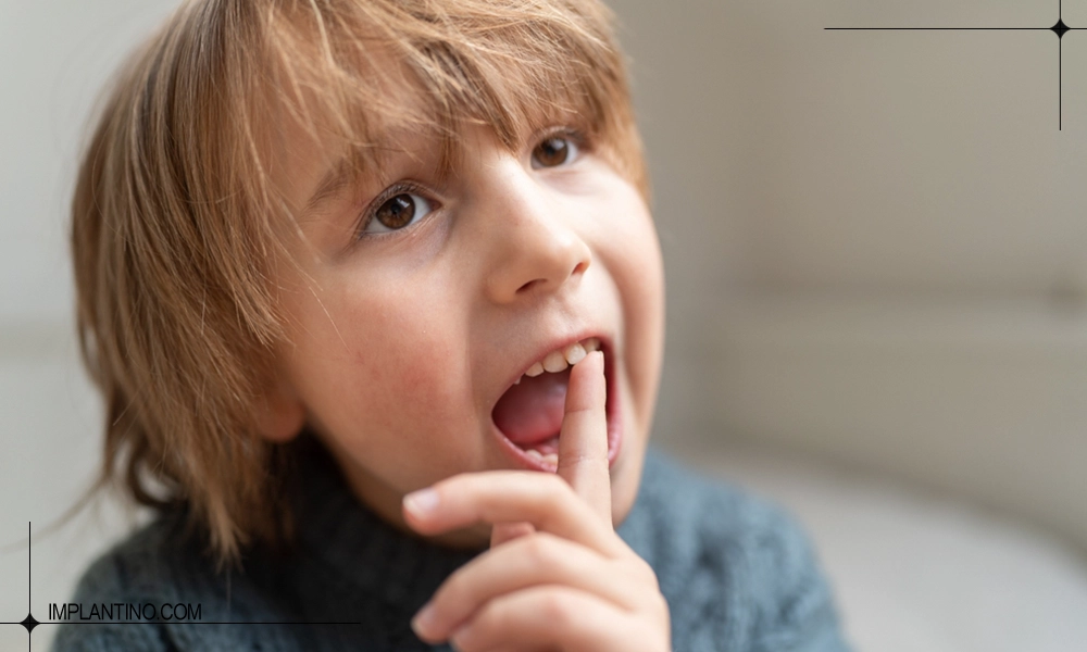 کودکی با لق شدن دندان